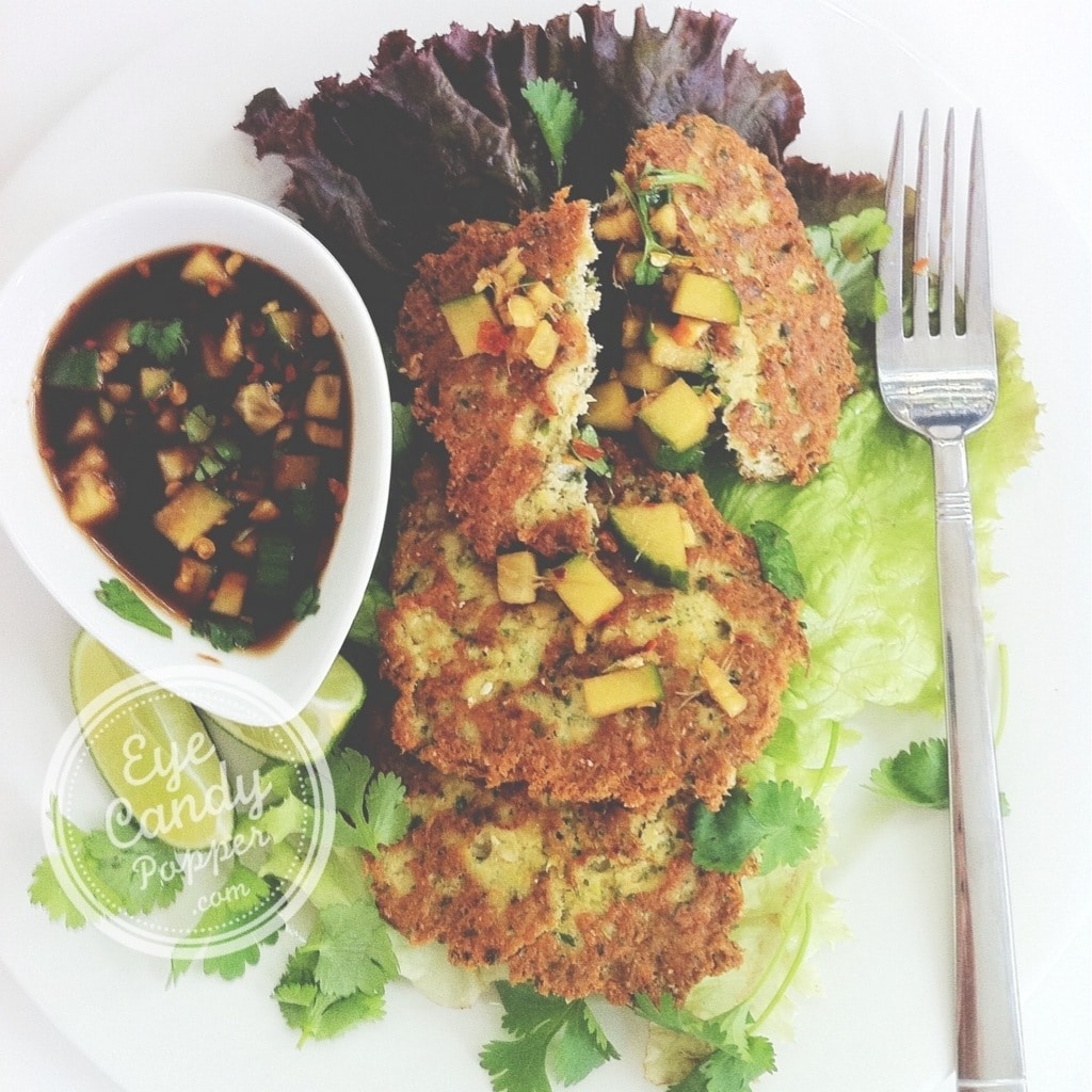 aerial view wild salmon cakes on top of lettuce with soy dipping sauce