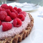 Delicious raw pie made with nuts, figs and fresh raspberries