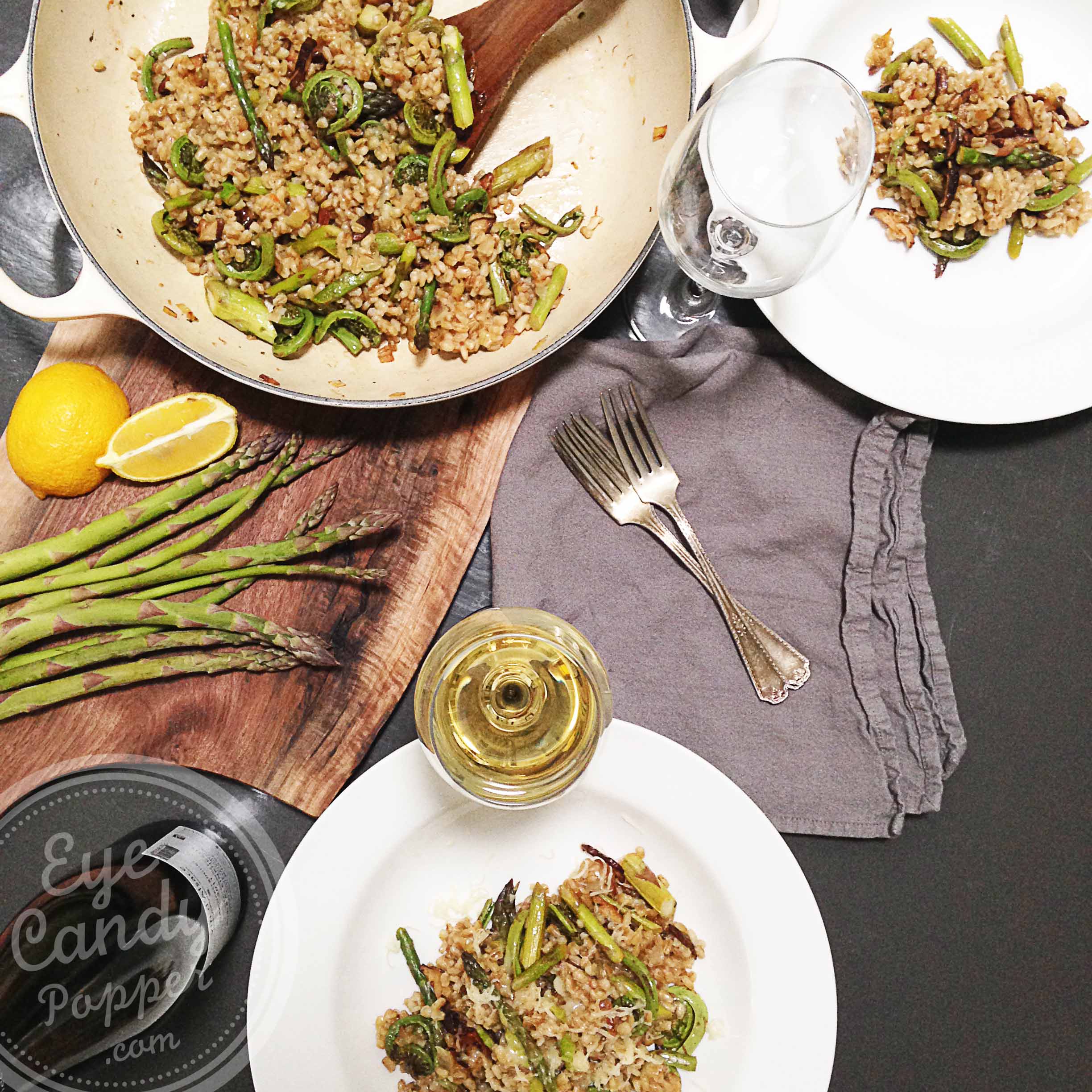 Vegan barley risotto with wild fiddleheads and asparagus