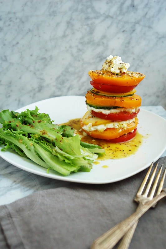Heirloom tomato, zucchini and goat cheese stack