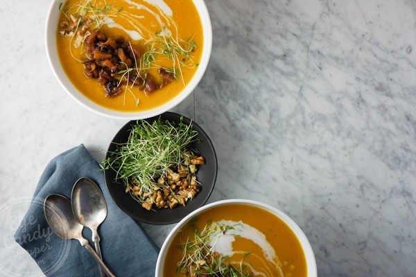 Roasted garlic and butternut soup with apple chutney and crunchy toppings
