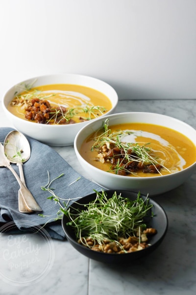 Roasted garlic and butternut soup with apple chutney and crunchy toppings